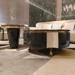 Designer Nesting Coffee Tables with Organic Curves and Layered Silhouettes